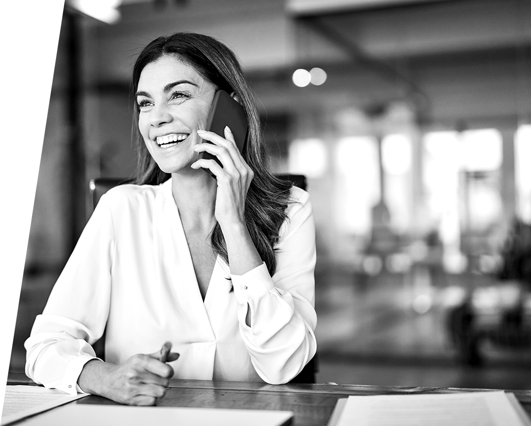 Business woman talking on the phone in her office